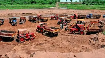 Along with Covid-19 control, AP begins sand mining to set economy